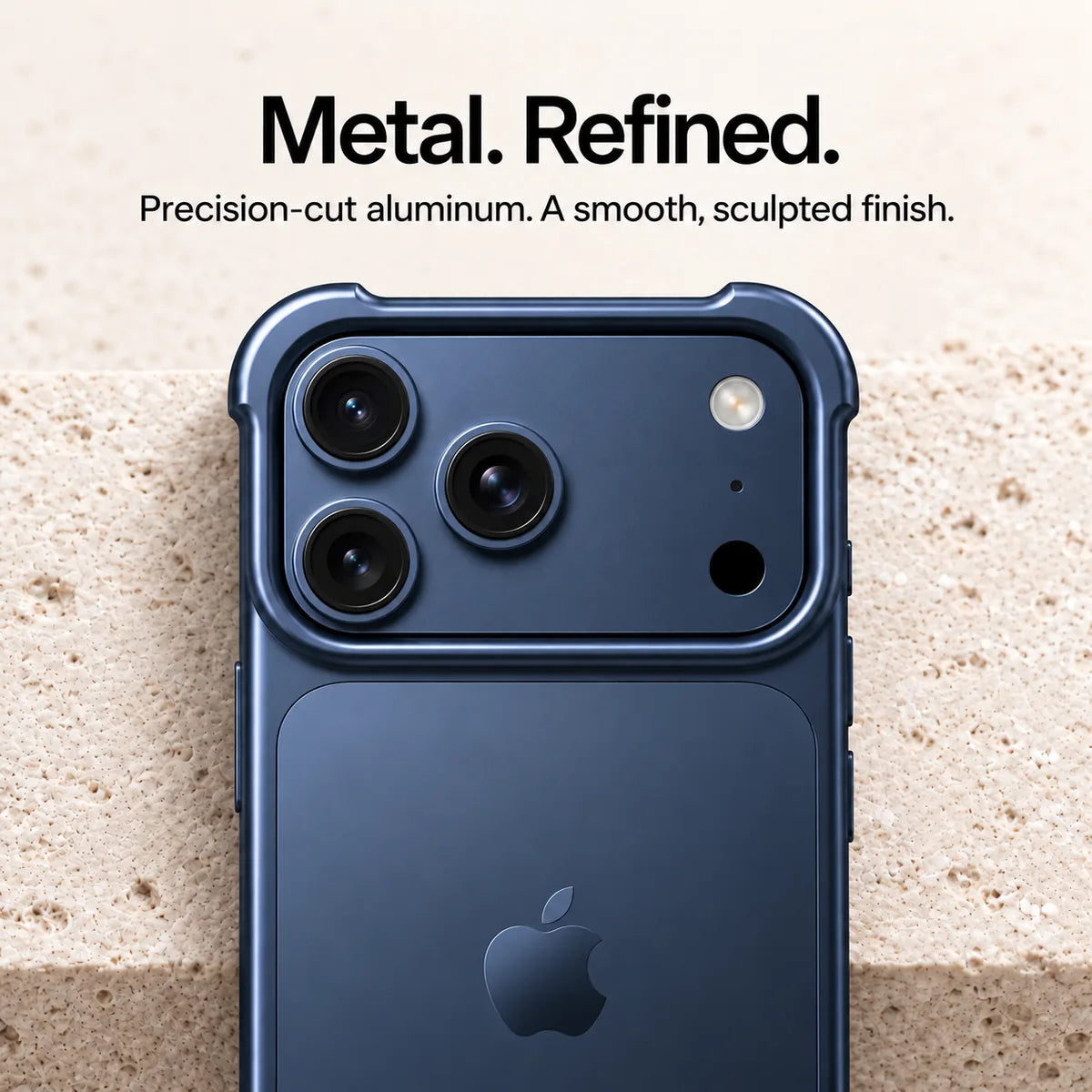 Dark blue metal phone bumper in a close-up of the sculpted camera surround #color_Deep Blue