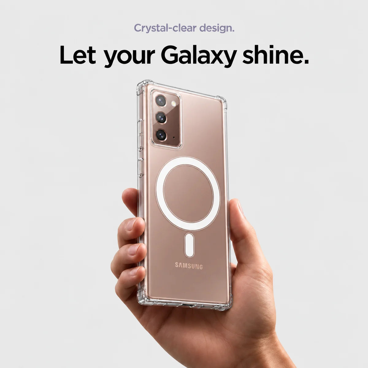 Clear magnetic phone case held at an angle, showing its transparent back and camera openings. #Samsung Model_Samsung Note 20