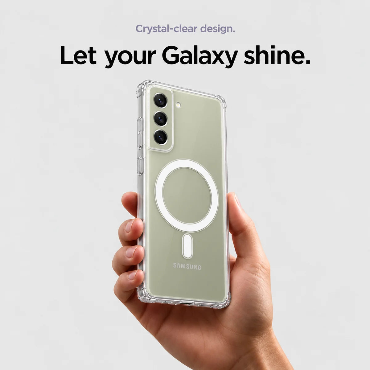 Clear magnetic phone case held at an angle, showing its transparent back and camera openings. #Samsung Model_Samsung S21 FE
