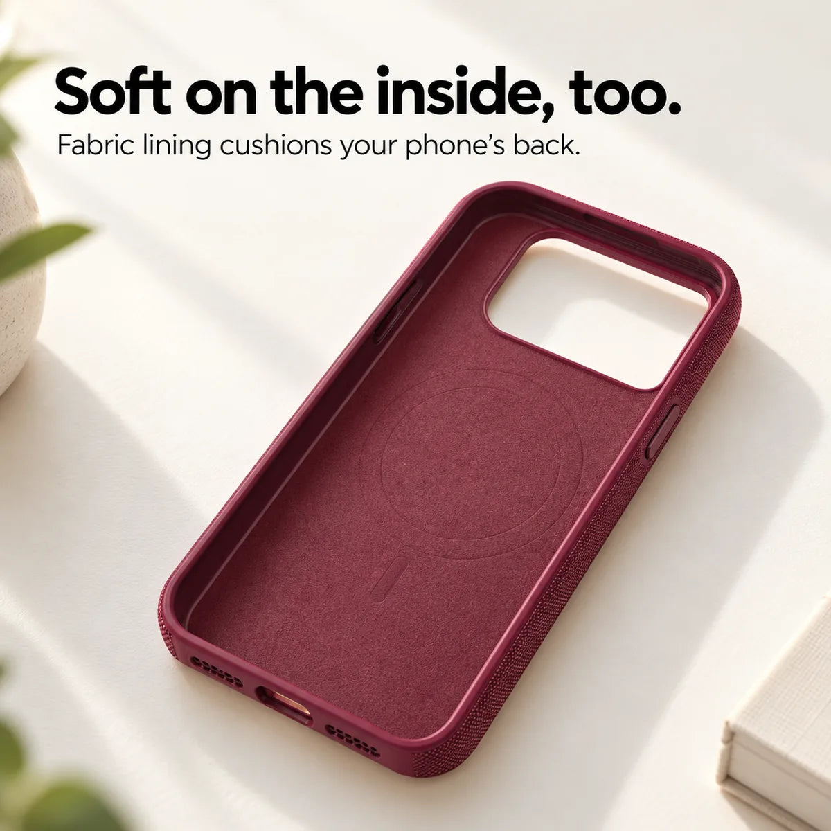 Soft fabric lining inside an empty Burgundy phone case. #color_Burgundy